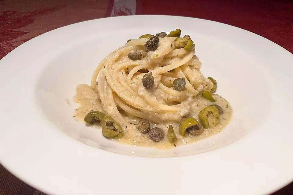 Ragù di seppie e coda di rospo